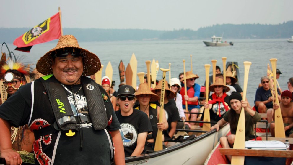 A group of people in two canoes | Homalco Wildlife & Cultural Tours